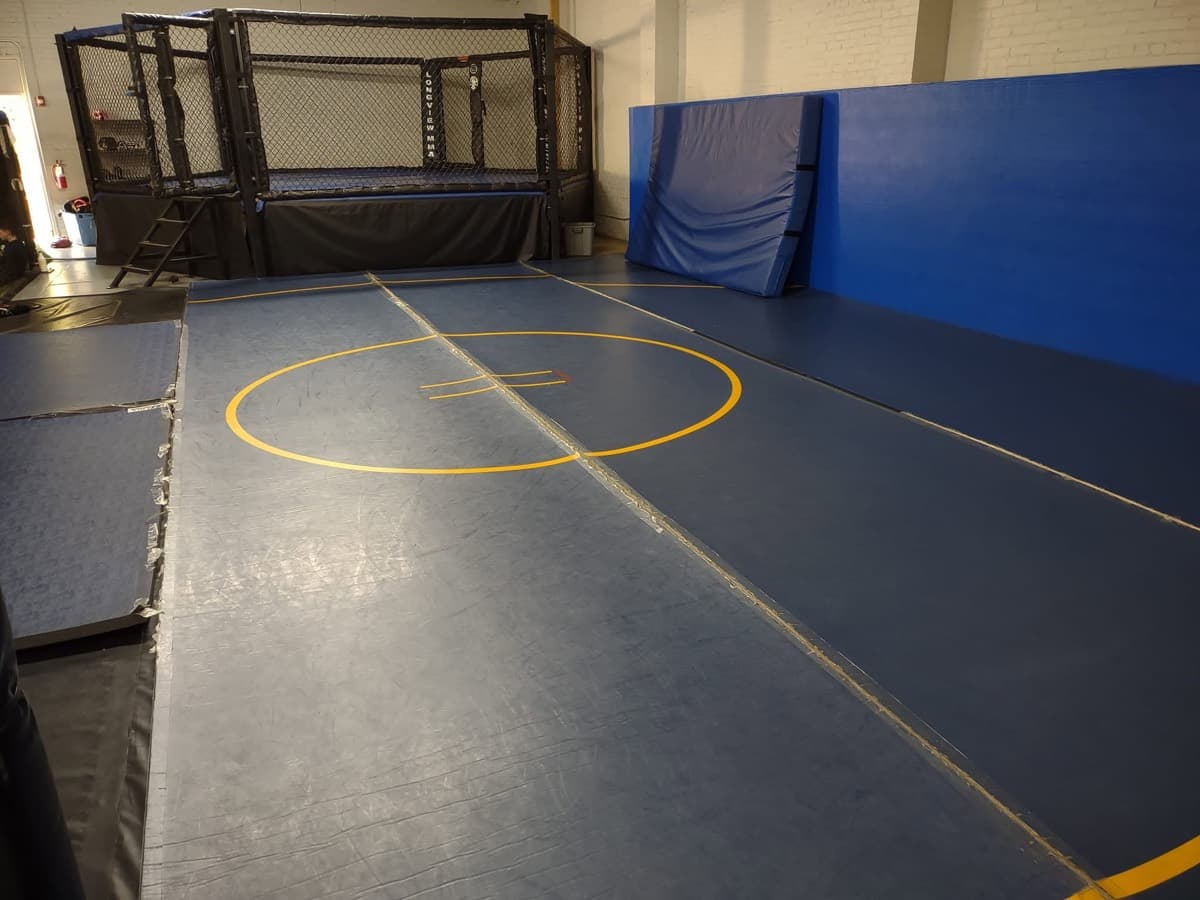 The grappling mats and cage